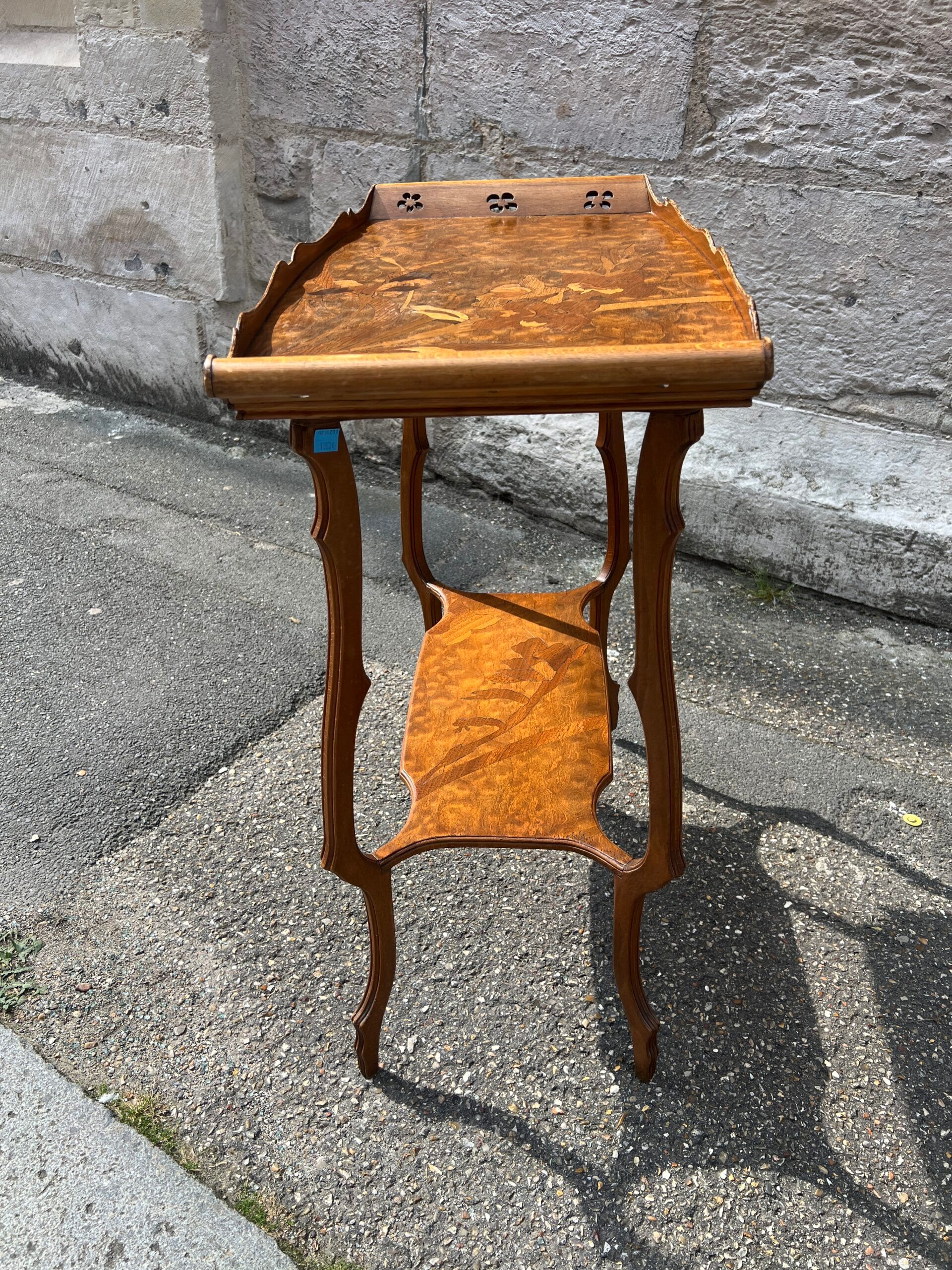 Art Nouveau period two-tiered tea table in veneered wood, signed Émile Gallé