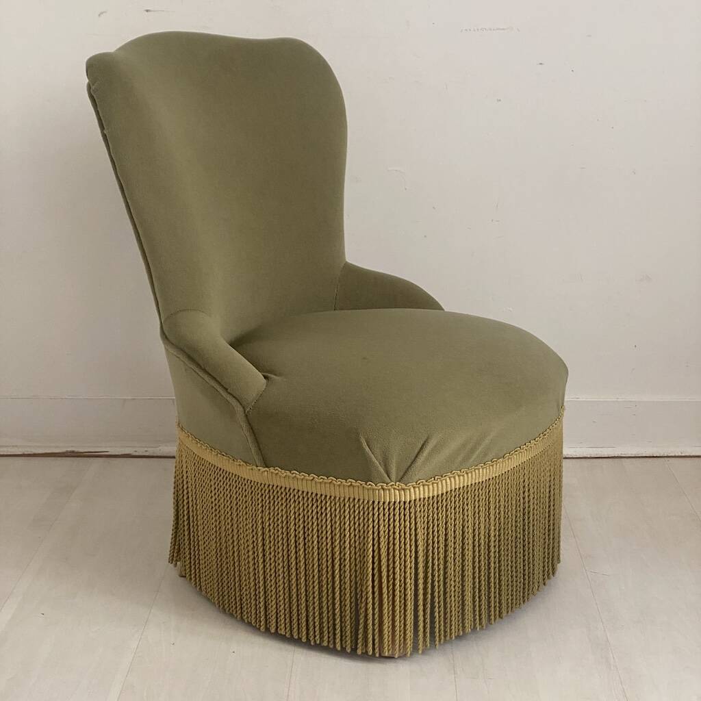 Small green velvet tub chair