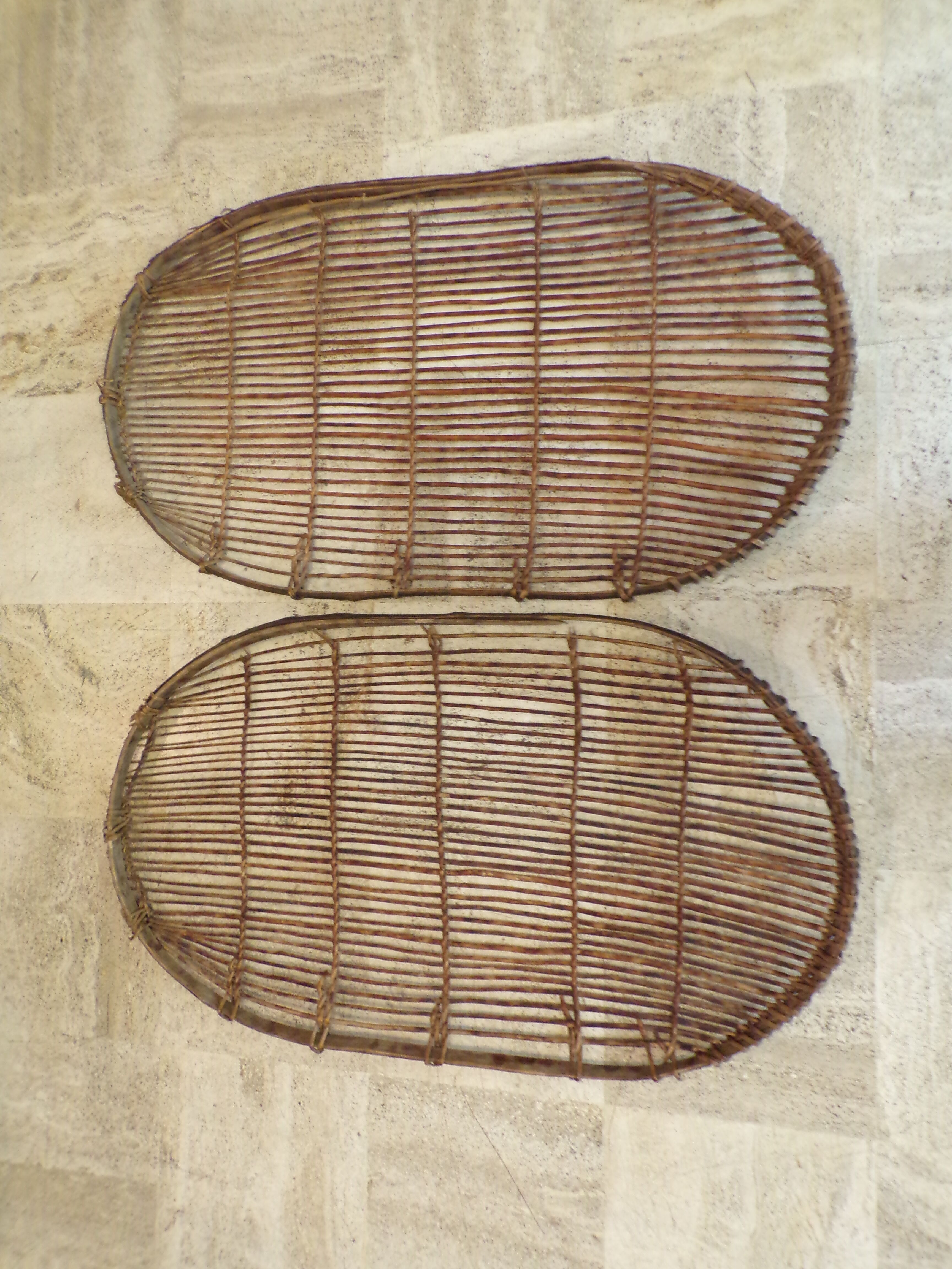 Duo of old wicker racks