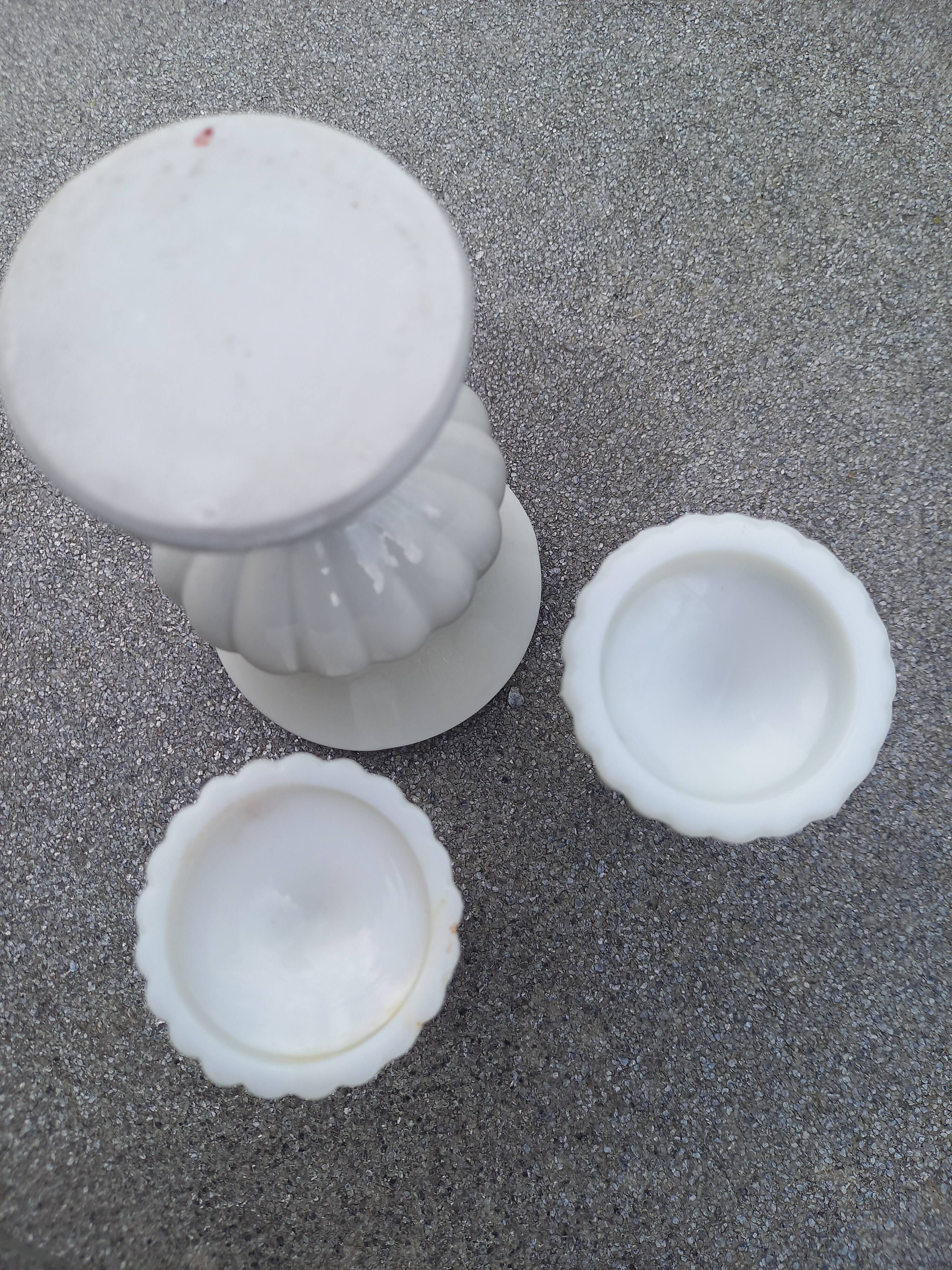 2 candle holders and earthenware vase