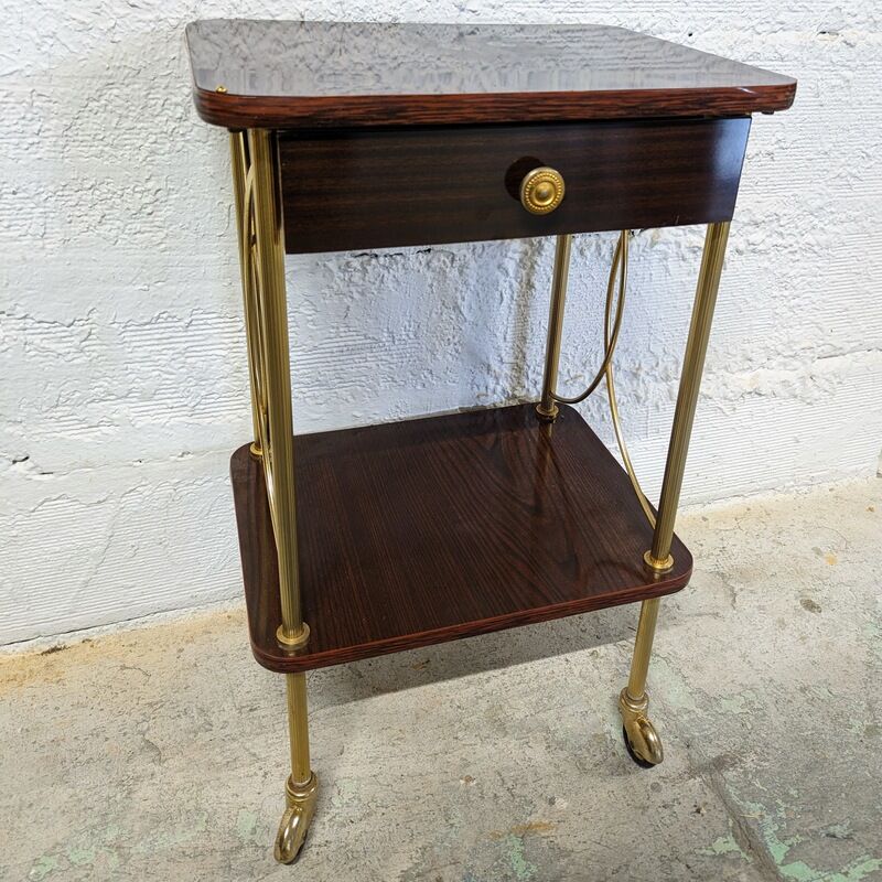 Vintage bedside table with wheels
