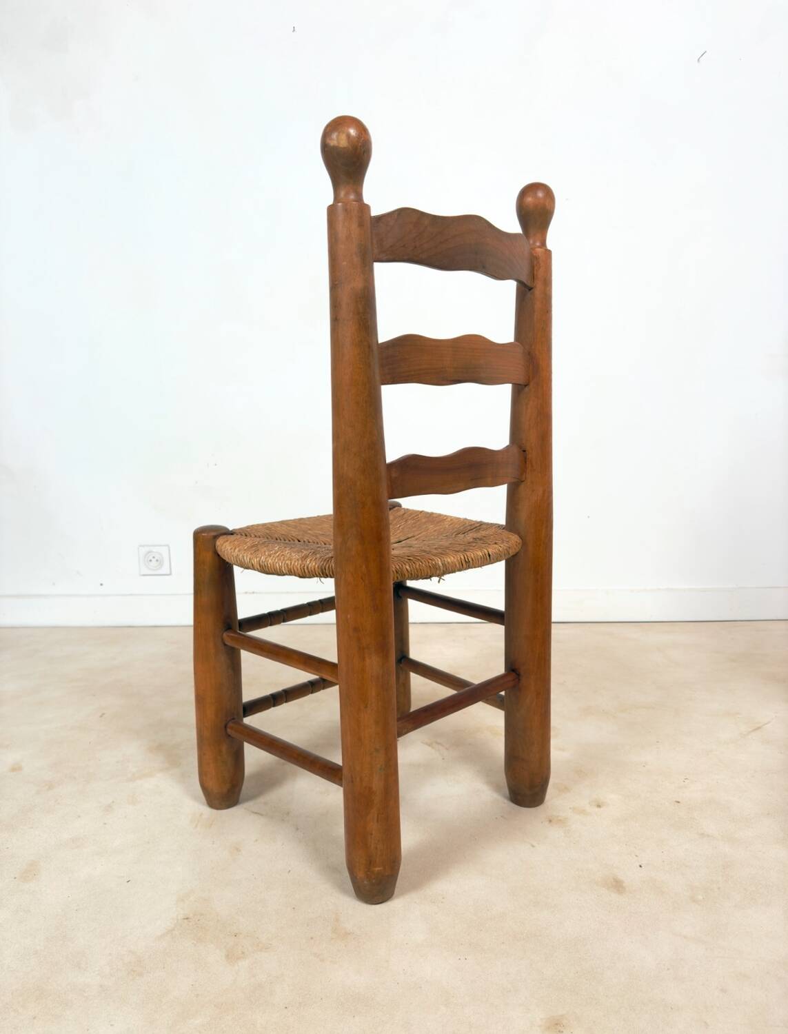 Vintage wooden chair with rush seating