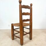 Vintage wooden chair with rush seating