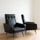 Pair of vintage 70s armchairs in black faux leather.