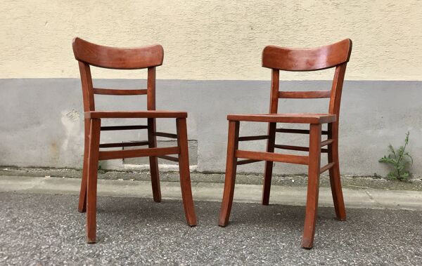 Paire de chaises bistrot en bois avec patine orangée 1950