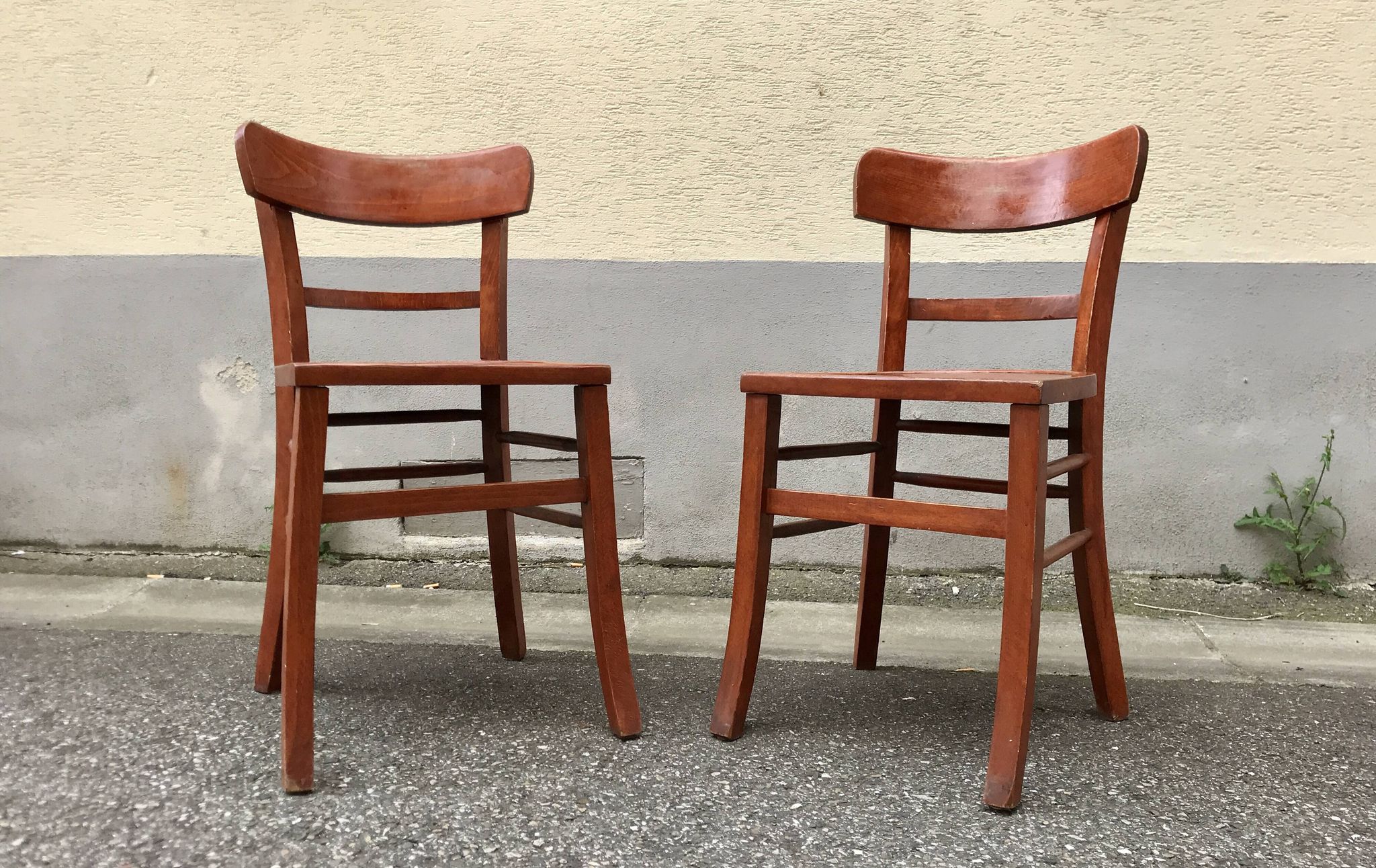 Pair of wooden bistro chairs with orange patina, 1950s
