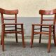 Pair of wooden bistro chairs with orange patina, 1950s