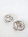 Pair of shell-shaped stainless steel catchalls, design, 1970