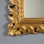 Eclectic antique mirror in carved and gilded wood, Italy, 20th century