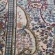 Hand-knotted rug with patterns – 232x139cm