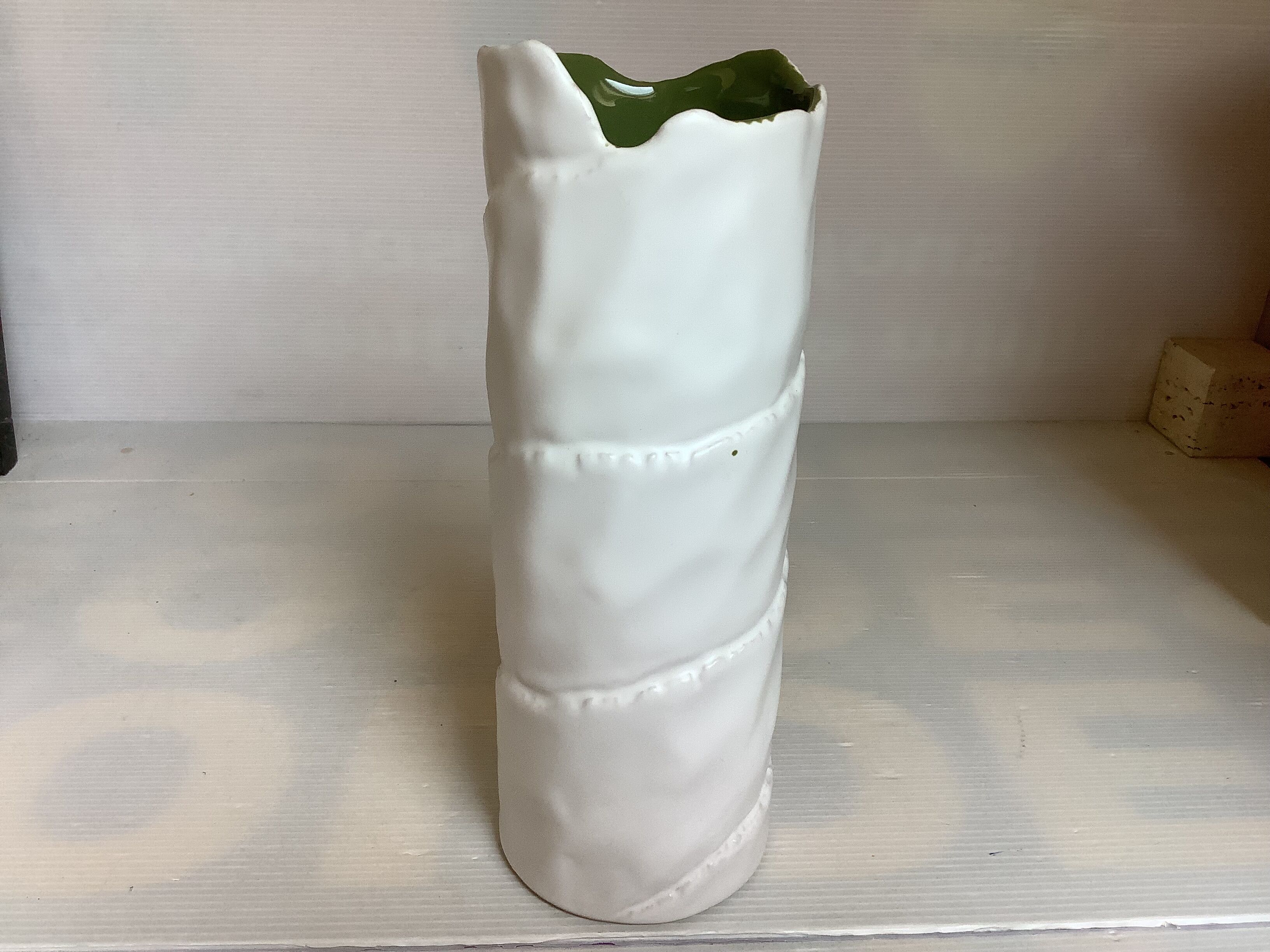 Vase with patterns of rolled paper leaves