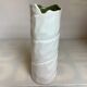 Vase with patterns of rolled paper leaves