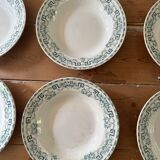 Set of eight Moulin des loups soup plates
