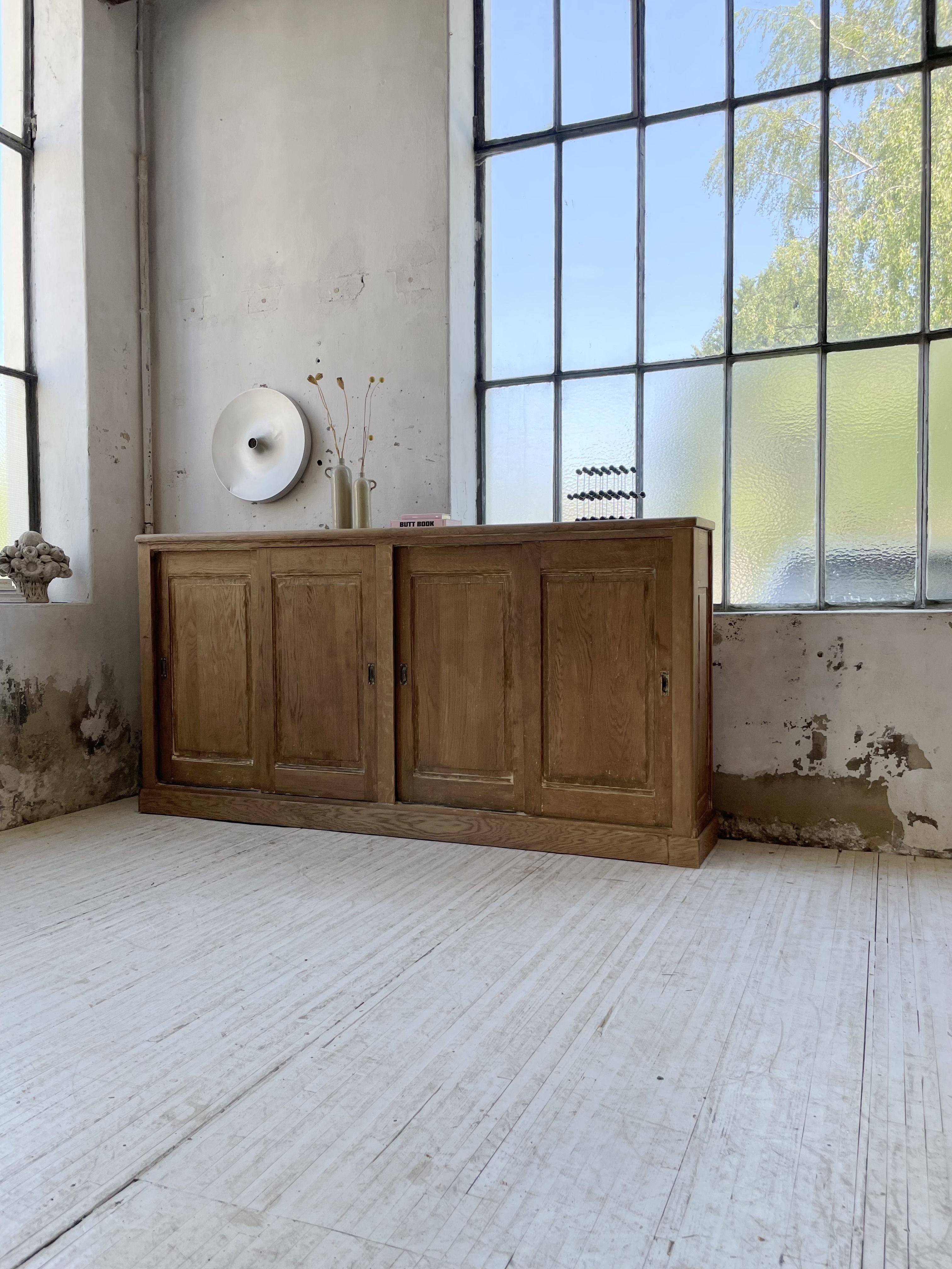 Large row of solid oak loom sliding doors