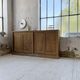 Large row of solid oak loom sliding doors