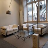 A sofa and two LC2 Cassina armchairs