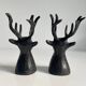 Salt and pepper shaker set with patinated brass deer heads.