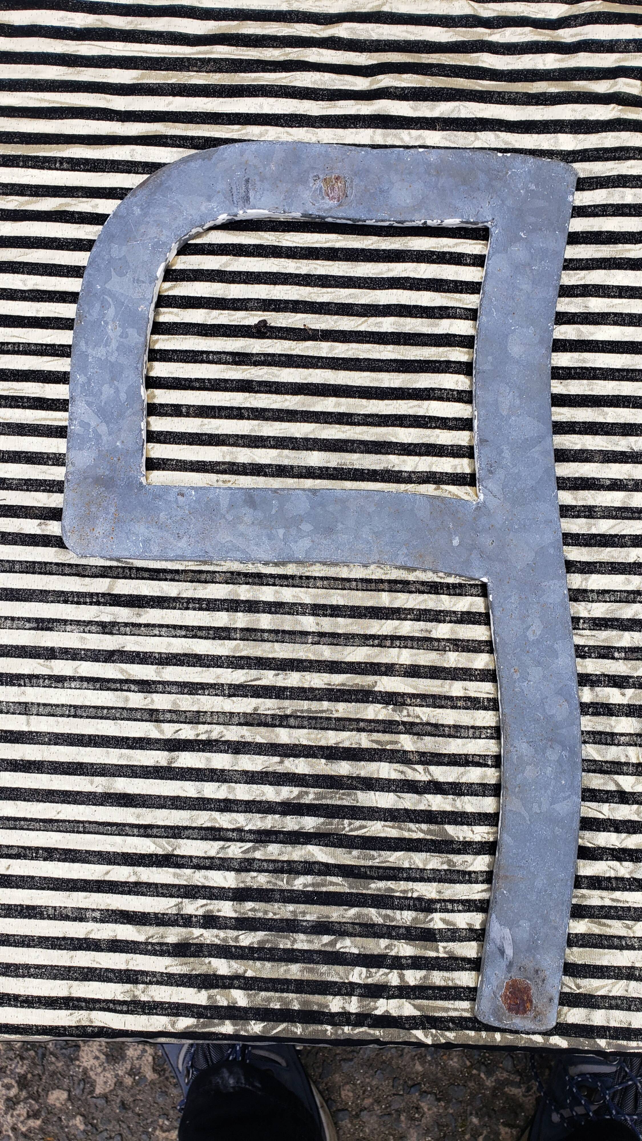 Letter p in galvanized metal