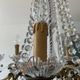 Grand chandelier in Louis XV style with crystal pendants.