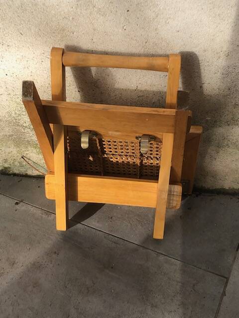 Wooden and cane bedside table