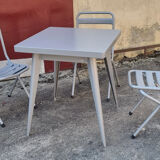 Table Tolix, industrial design, and its 3 folding chairs, designed by Xavier Pauchard