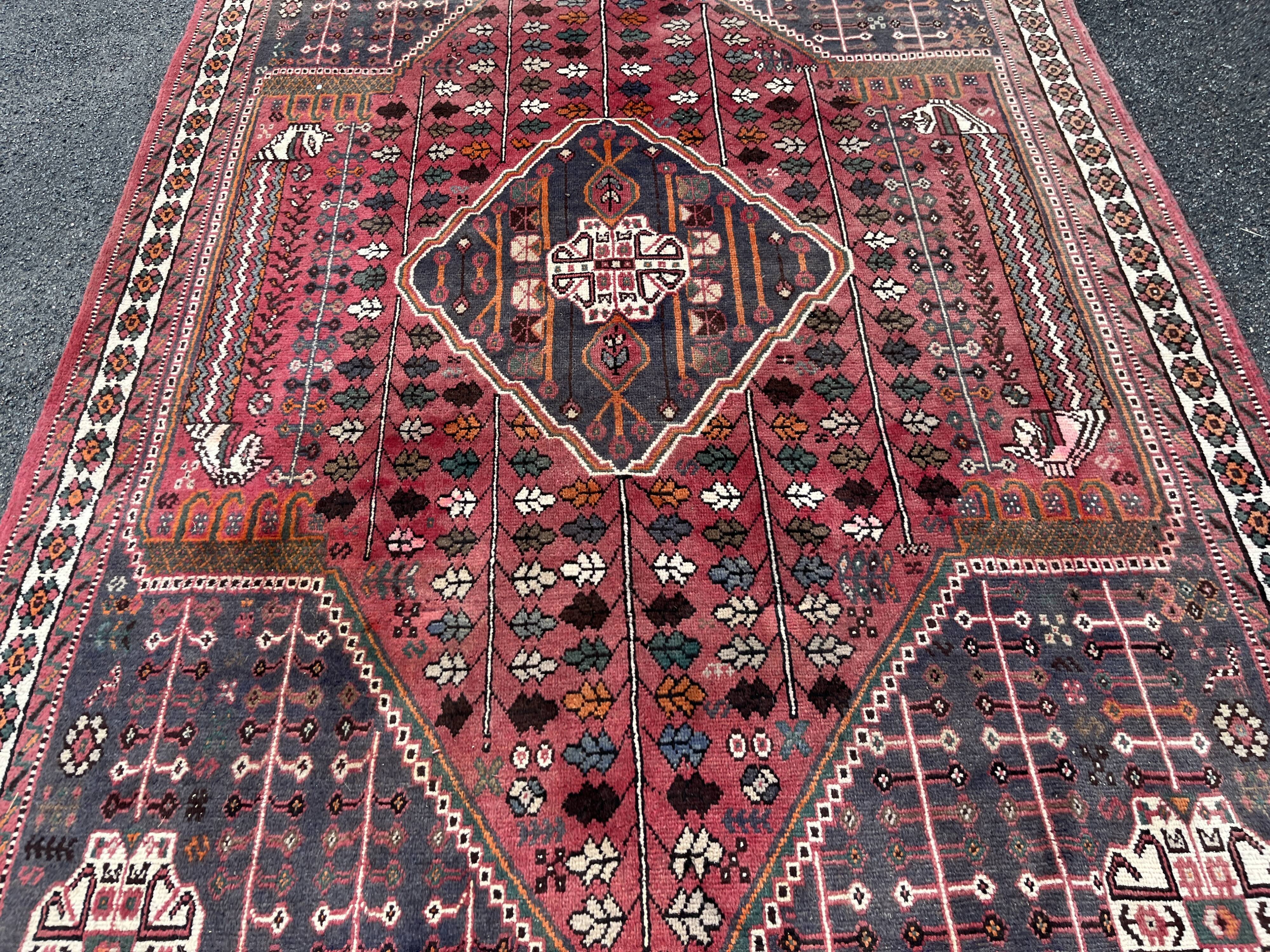 Large red Persian wool rug with red geometric design 2.97 x 2.05 m