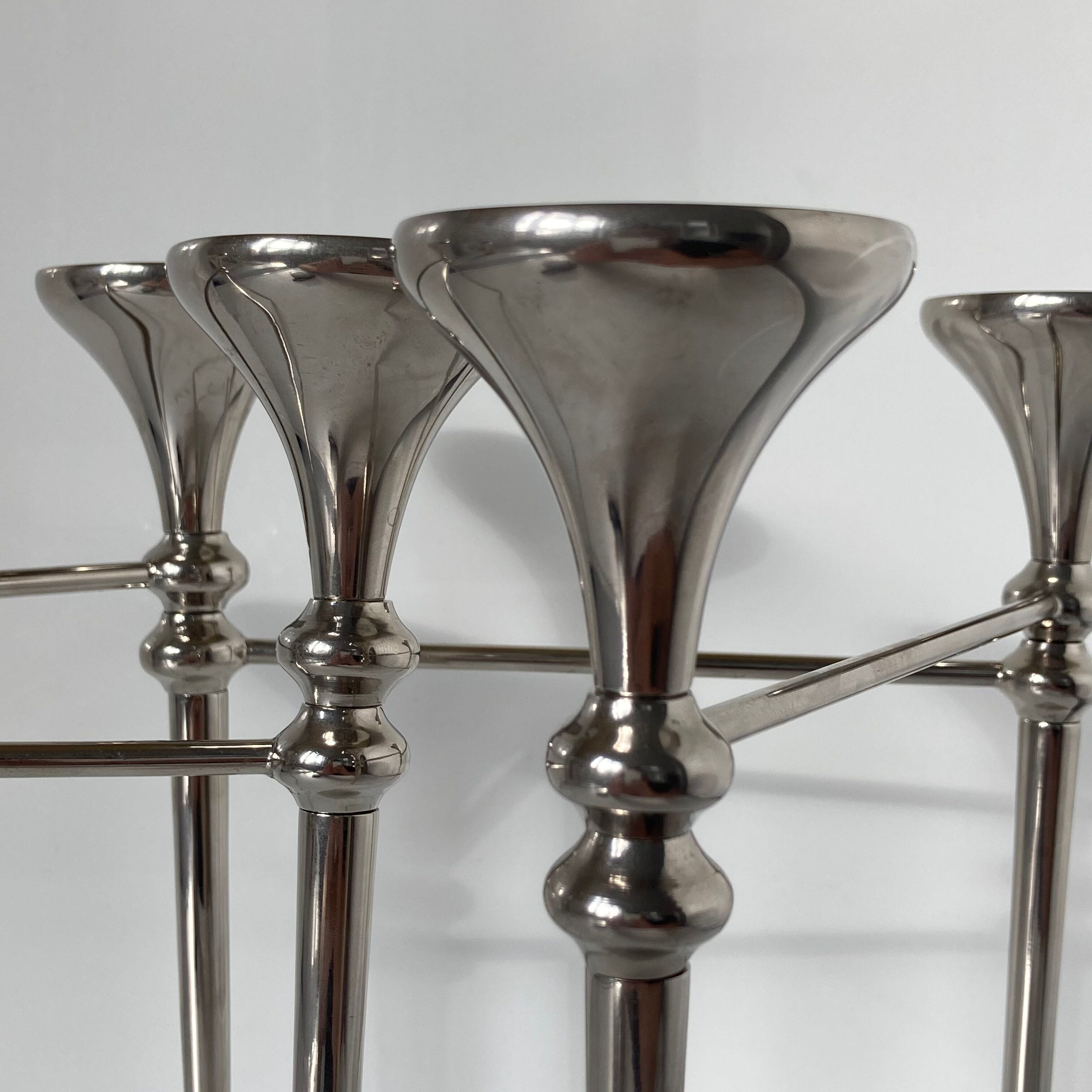 Articulated candlestick for 5 candles in chromed steel from the 1970s