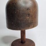 Old solid wood hat shape on foot, 1900