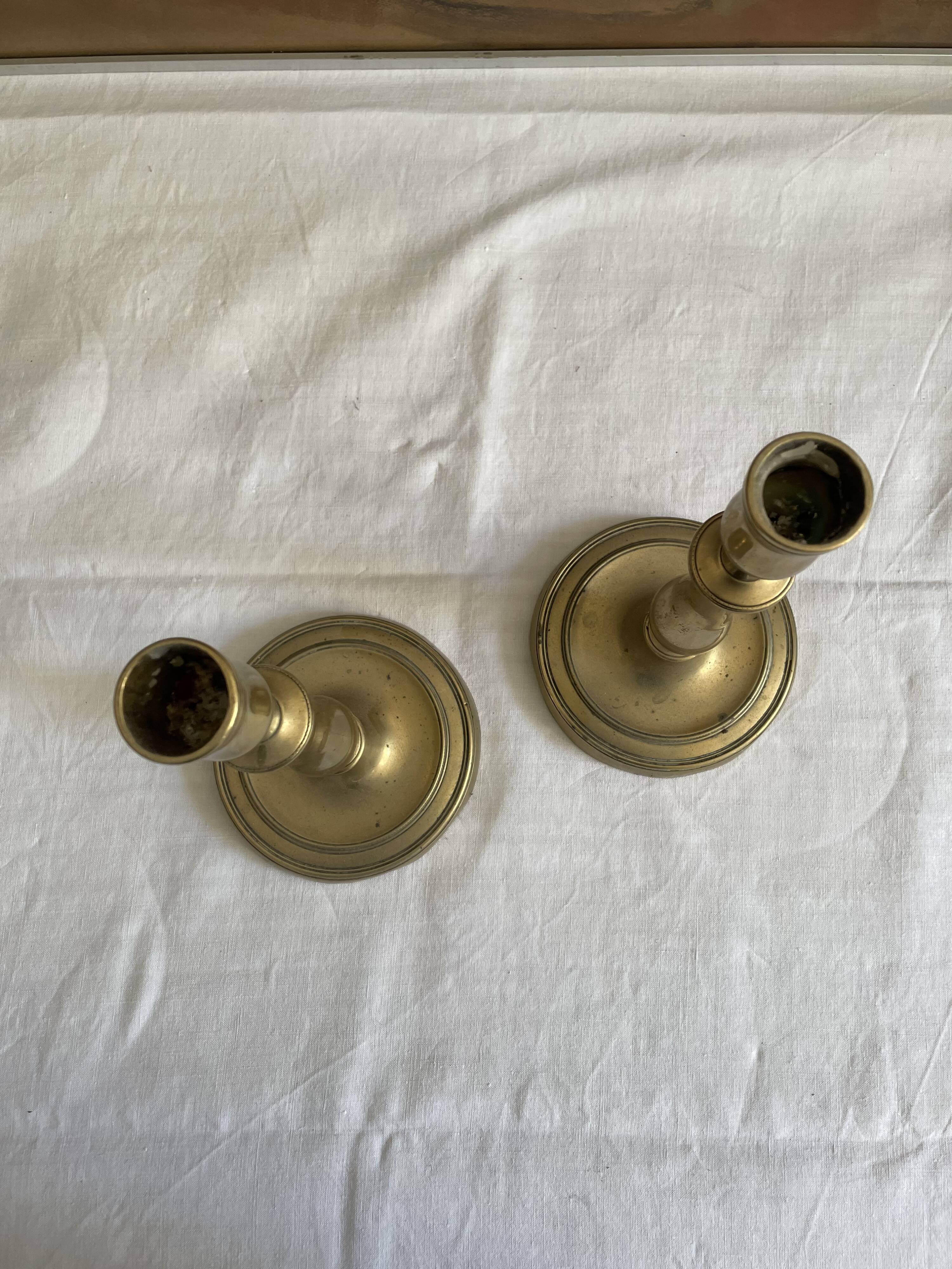 Pair of brass candle holders