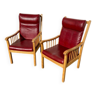 Pair of Baumann leather armchairs