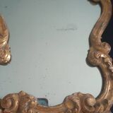19th century mercury mirror. Wood surround gilded with fine gold.