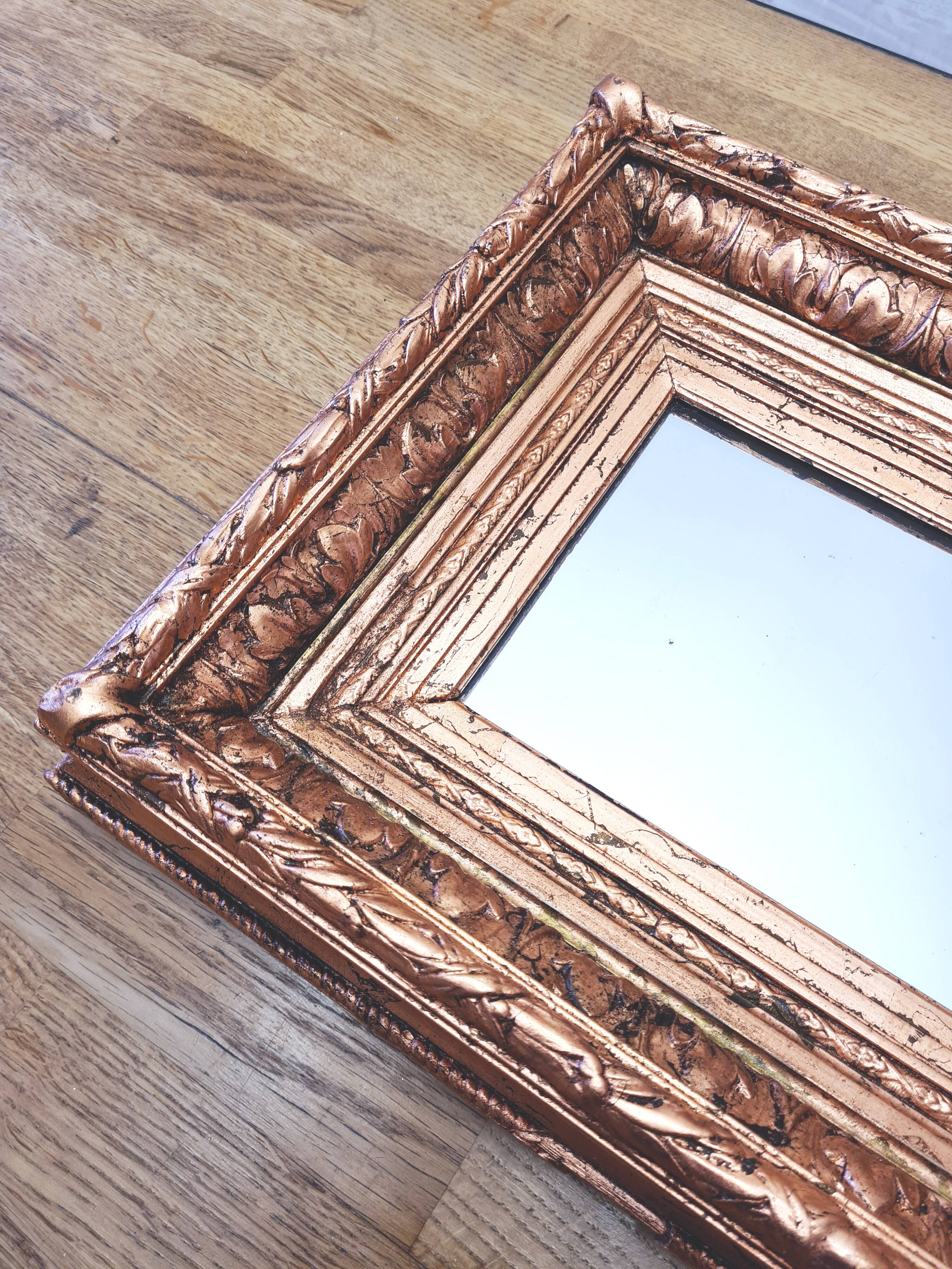 Napoleon III mirror, Wood and stucco, Gilded with copper leaf.