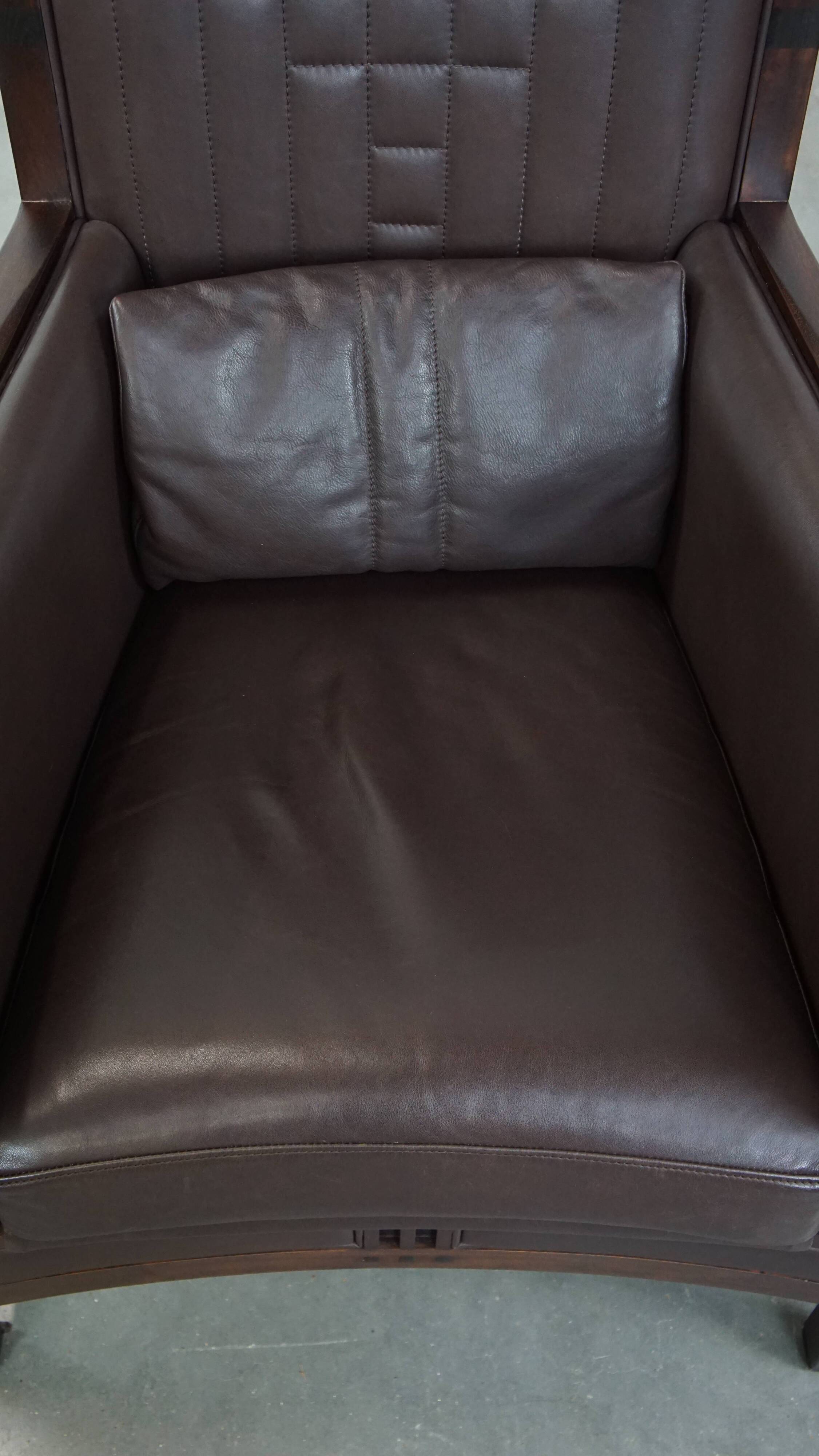 Art Deco armchair with dark brown leather