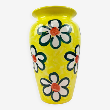 Large vase decorated with flowers