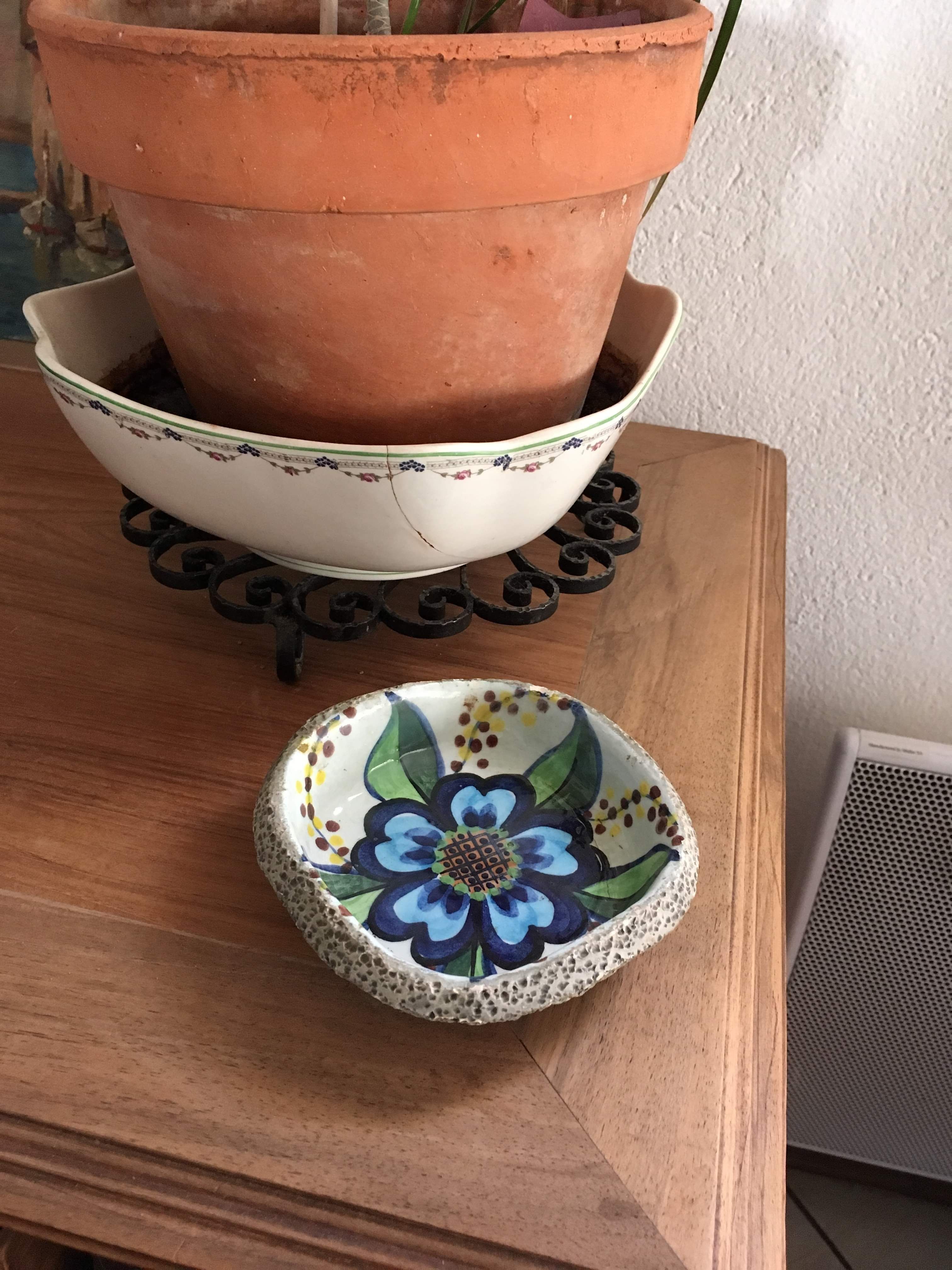 Cup lava foam with blue flower.