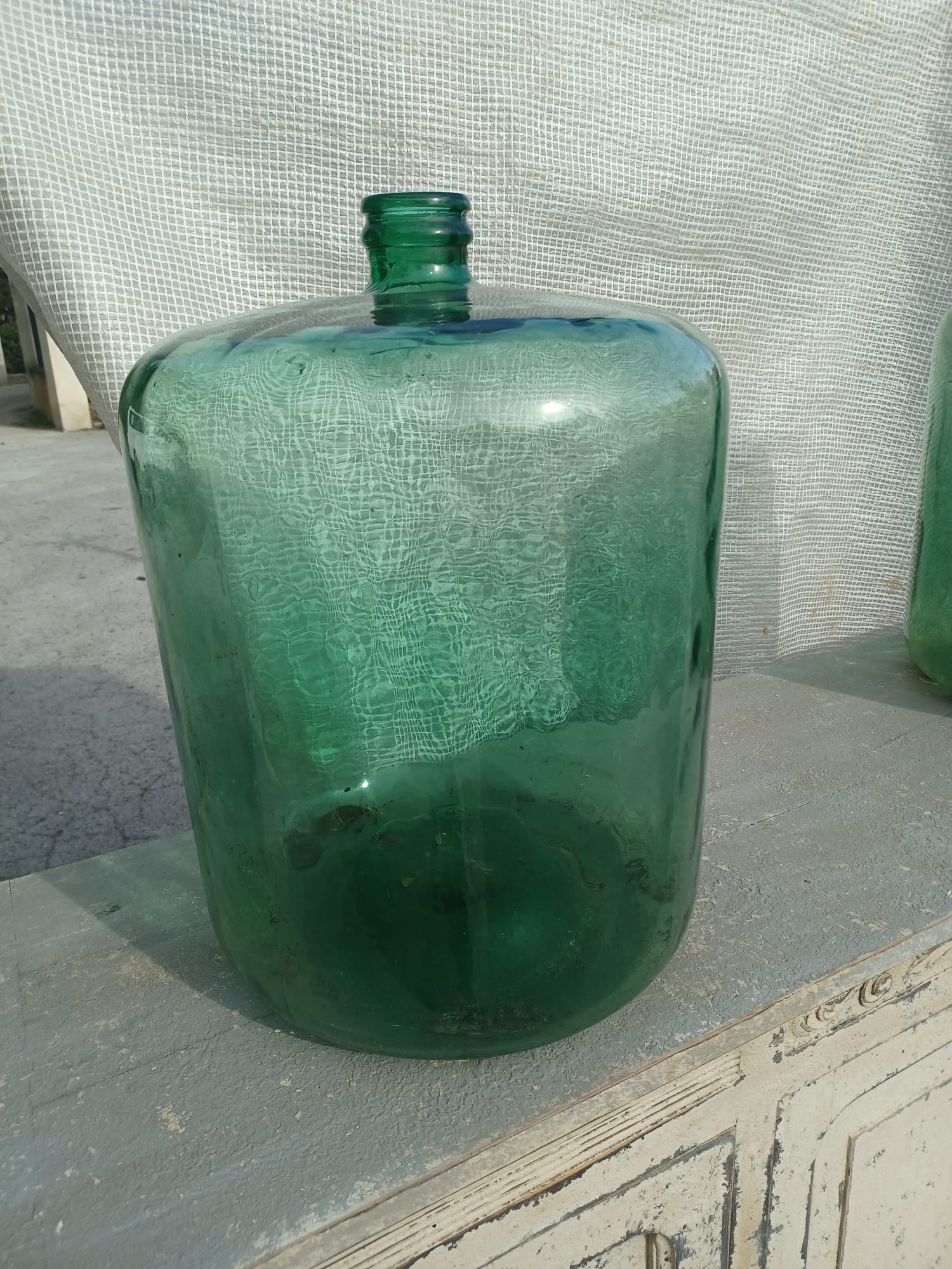 Two large glass bottles
