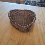 Small wicker basket in the shape of a heart.