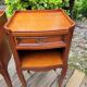 Pair of Louis XV bedside tables in cherry wood.