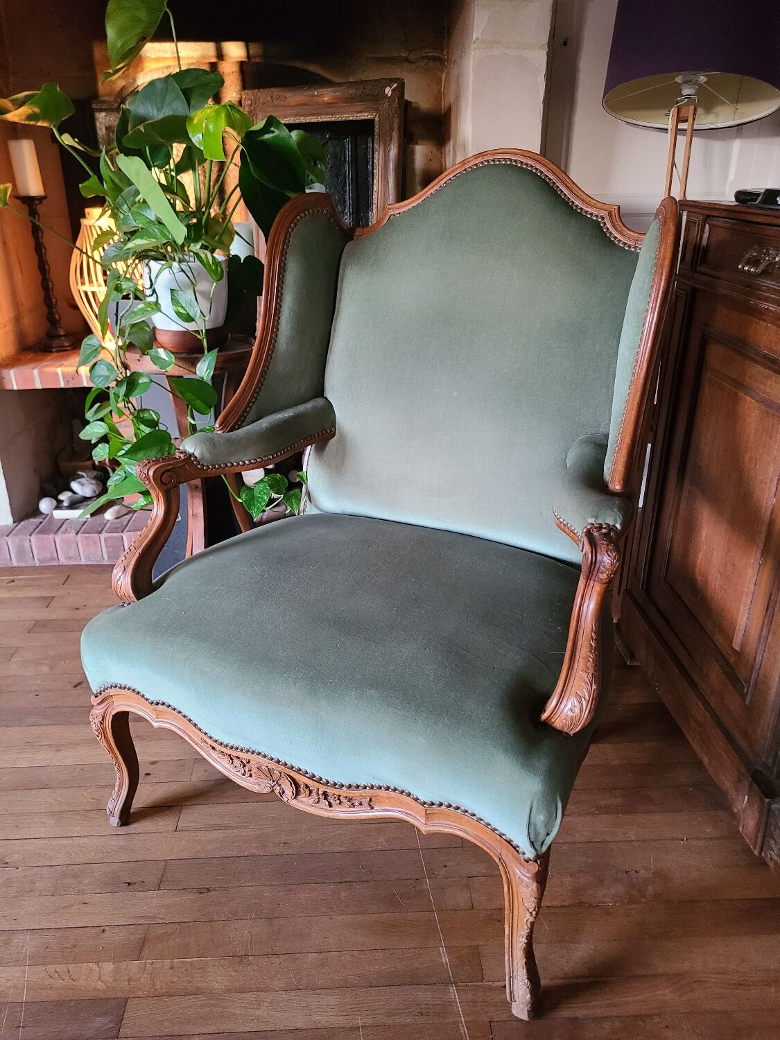 Vintage Louis XV style wing chair, light green velvet