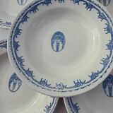 8 hollow plates in F J earthenware with frieze and central bouquet
