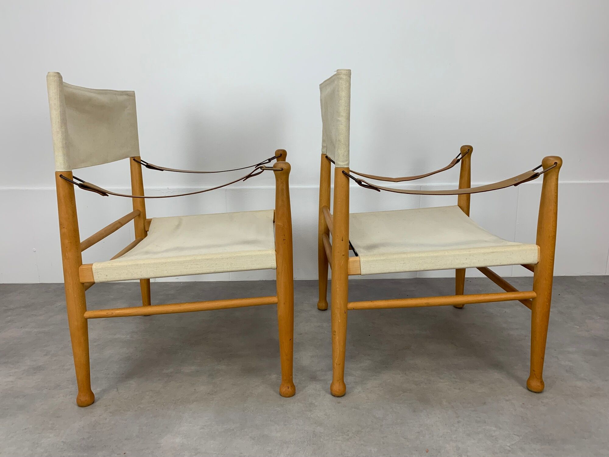 Pair of safari armchairs canvas and leather stretched