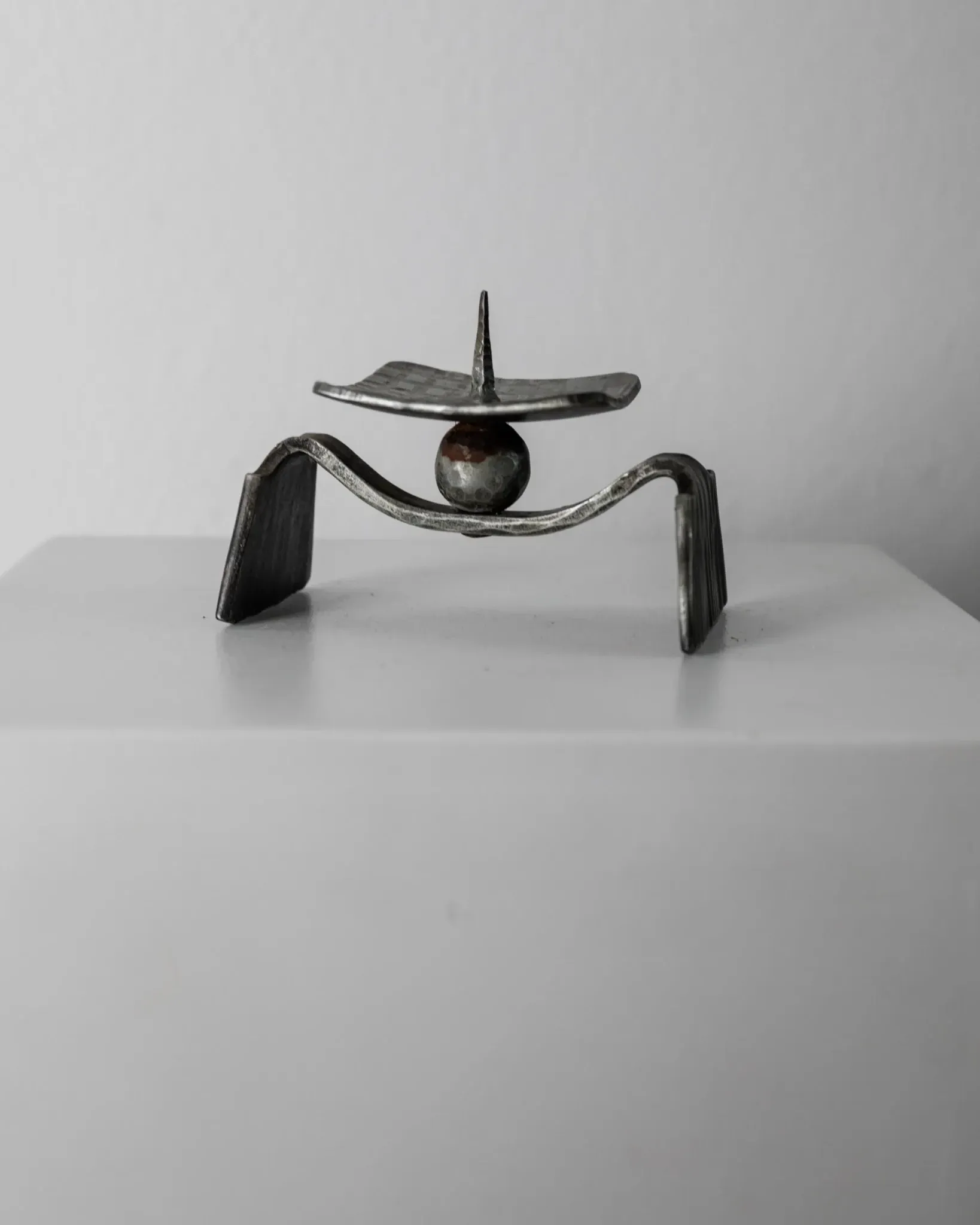 Vintage brutalist iron candlestick from the 1970s.