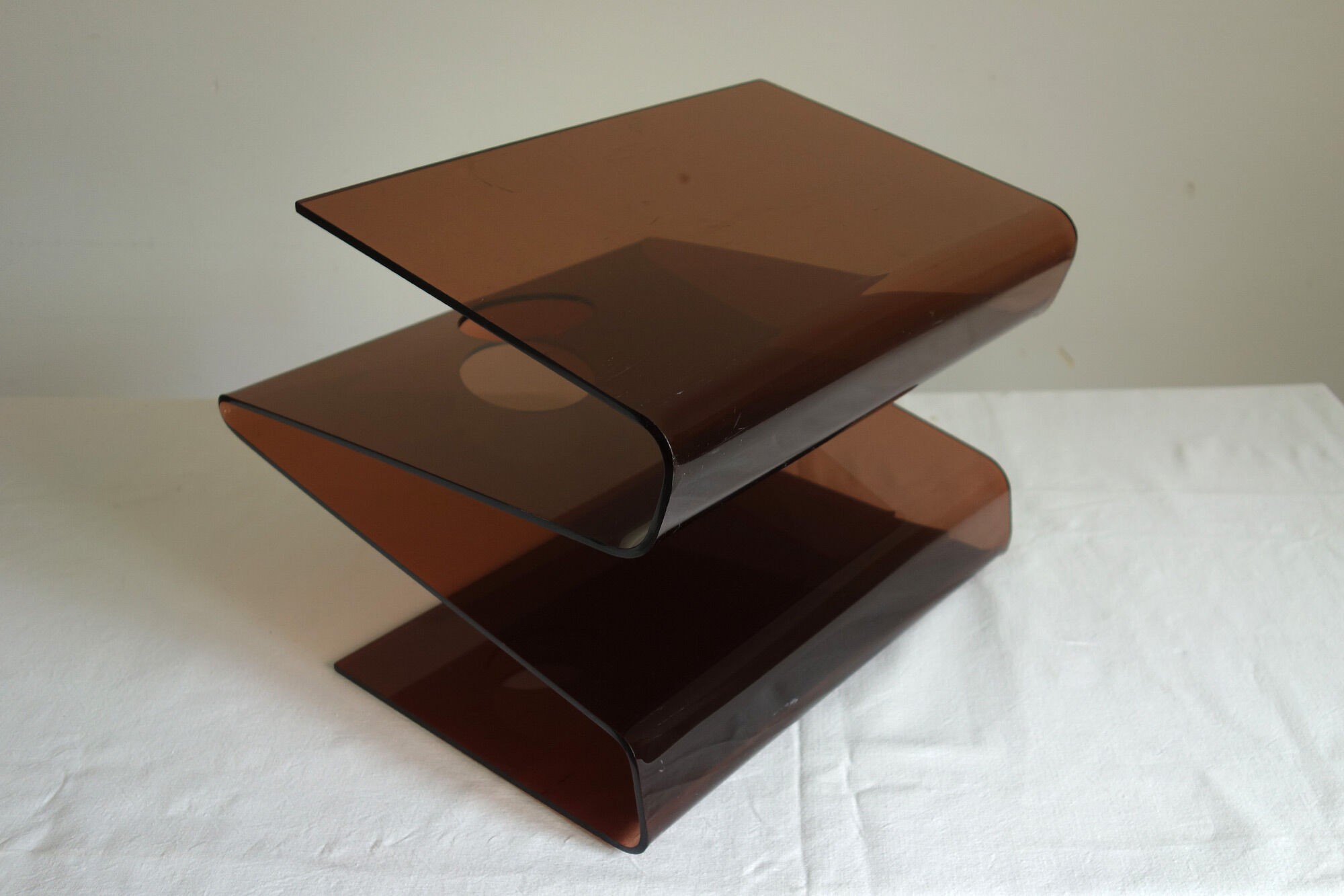 Smoked plexiglass magazine holder, 70s
