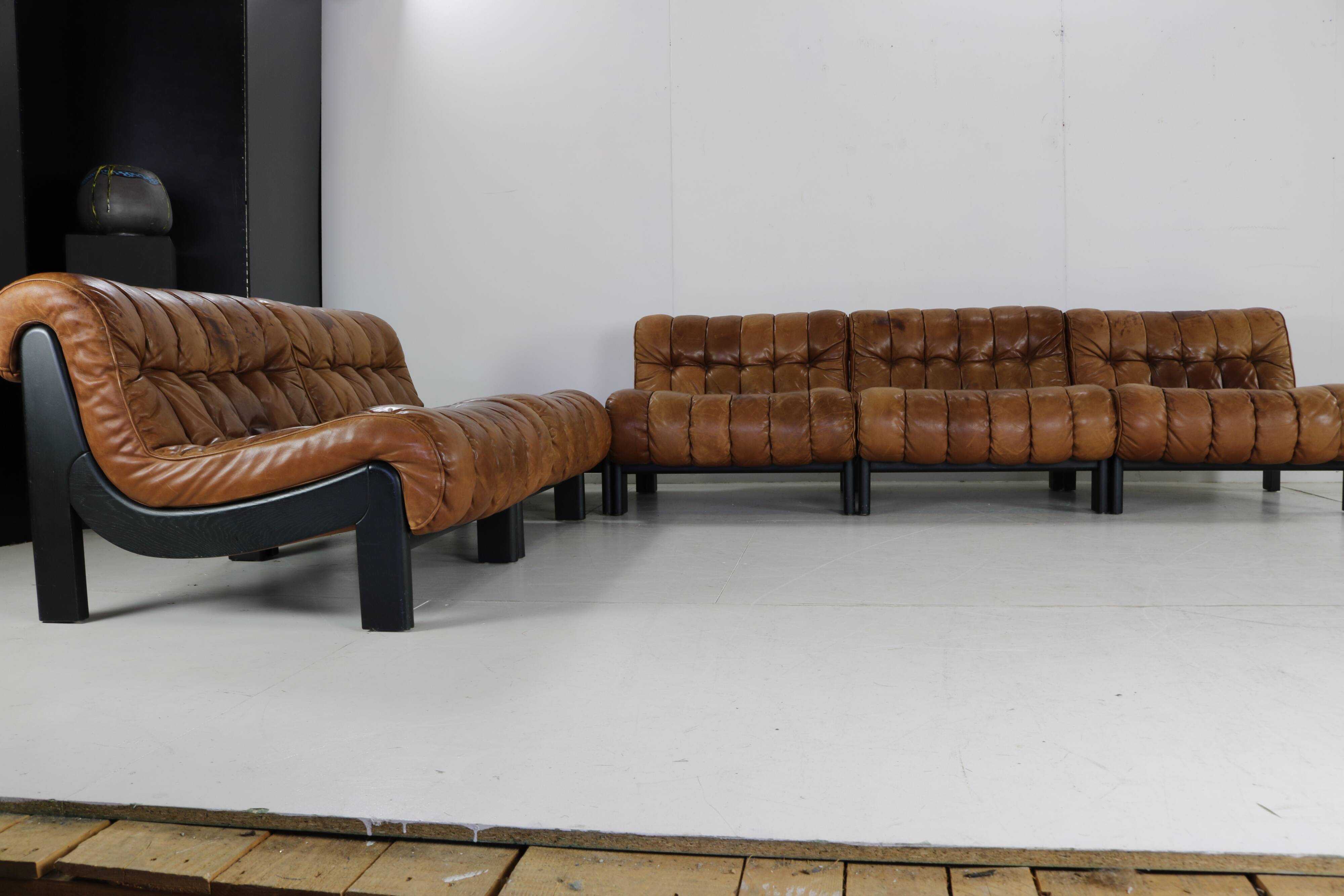 70s living room set in cognac brown leather with black wenge wood frame