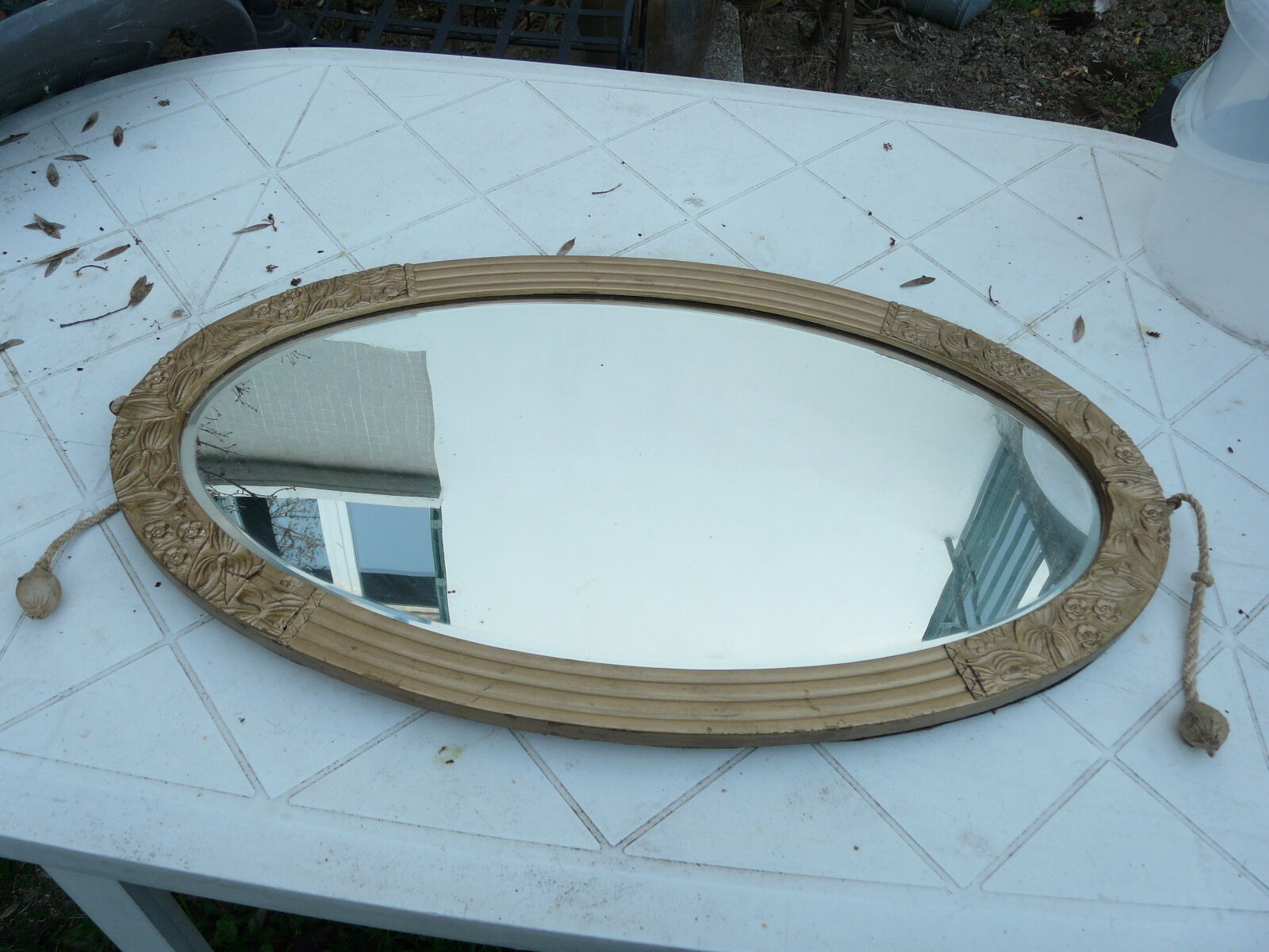 bevelled wooden art deco and gilded stucco bevelled mirror 66x39cm
