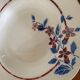 Saint Amand hollow plates decorated with red and blue flowers