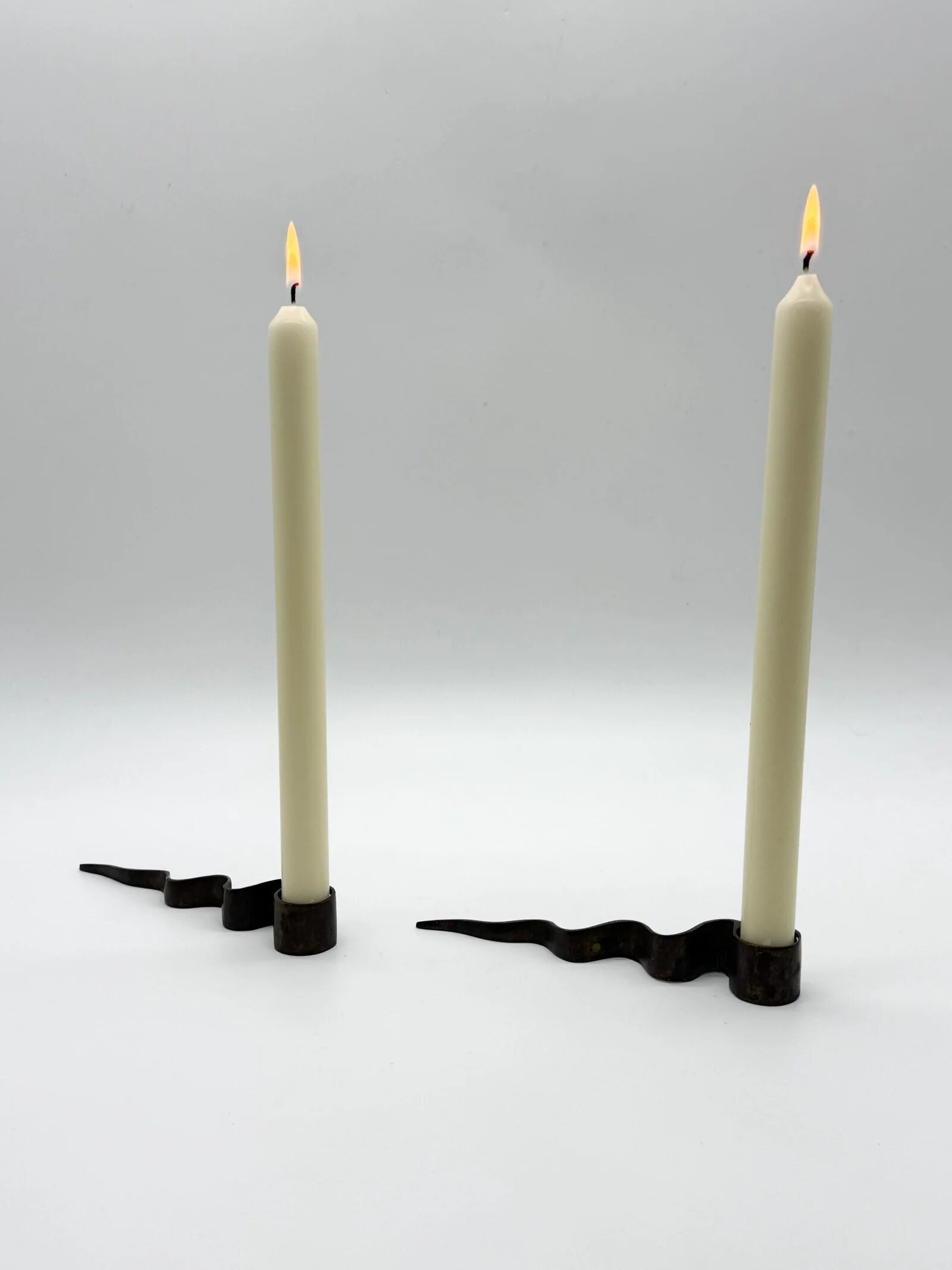 Pair of "Serpentine" candlesticks, modernist, 1970s