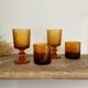8 mismatched vintage amber glasses