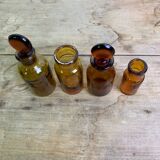 Lot of 4 amber apothecary bottles