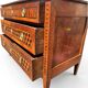Louis XVI commode with marquetry featuring a design of precious wood cubes, 18th century.